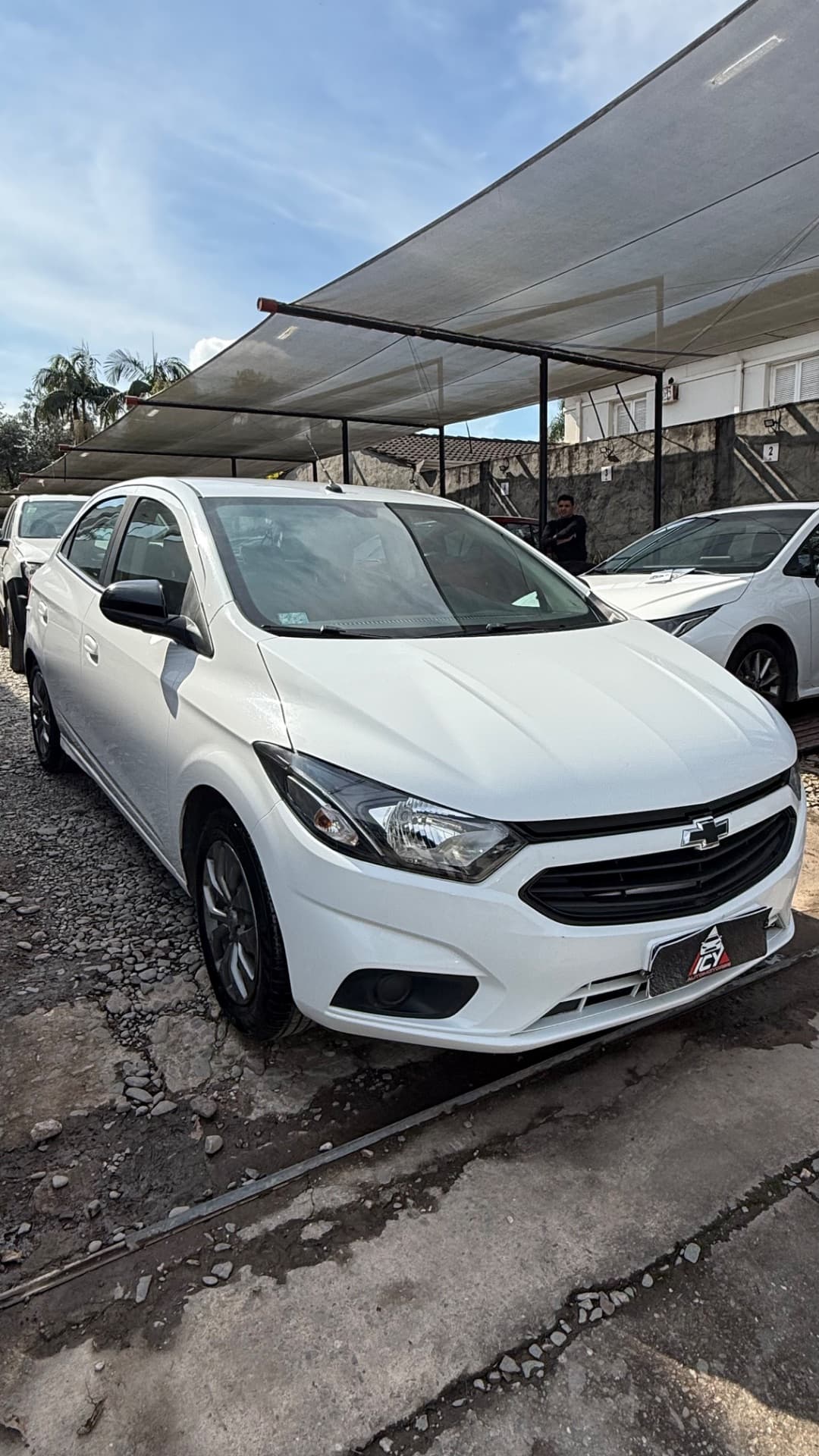 Chevrolet Onix Joy black — foto 1